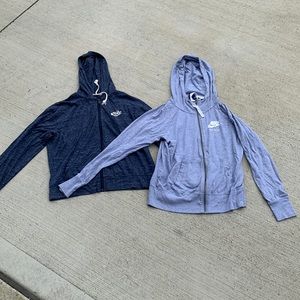 Two Nike zip ups size medium blue